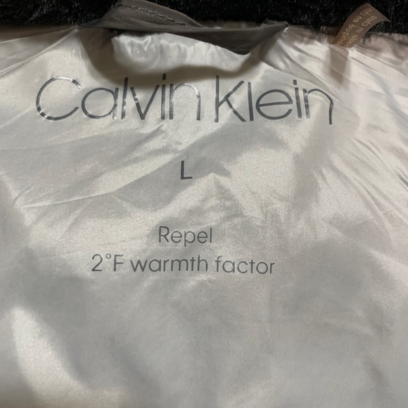 Calvin Klein Puffer jacket. Size Large. Color Gray with black faux fur. - Picture 4 of 13